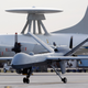 In this Nov. 8, 2011 file photo, a Predator B unmanned aircraft taxis at the Naval Air Station in Corpus Christi, Texas. AP Photo/Eric Gay, File